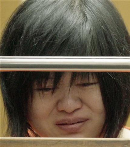 This March 16, 2012 file photo, Dr Lisa Tseng cries during her arraignment in court in Los Angeles. Attorneys are set to deliver opening statements Monday, Aug. 31, in the trial of Tseng, charged with murder the deaths of three young men who overdosed on prescription pain killers. Tseng has pleaded not guilty to three counts of second-degree murder. She could face up to life in prison if convicted on all the charges against her. (AP Photo/Nick Ut)