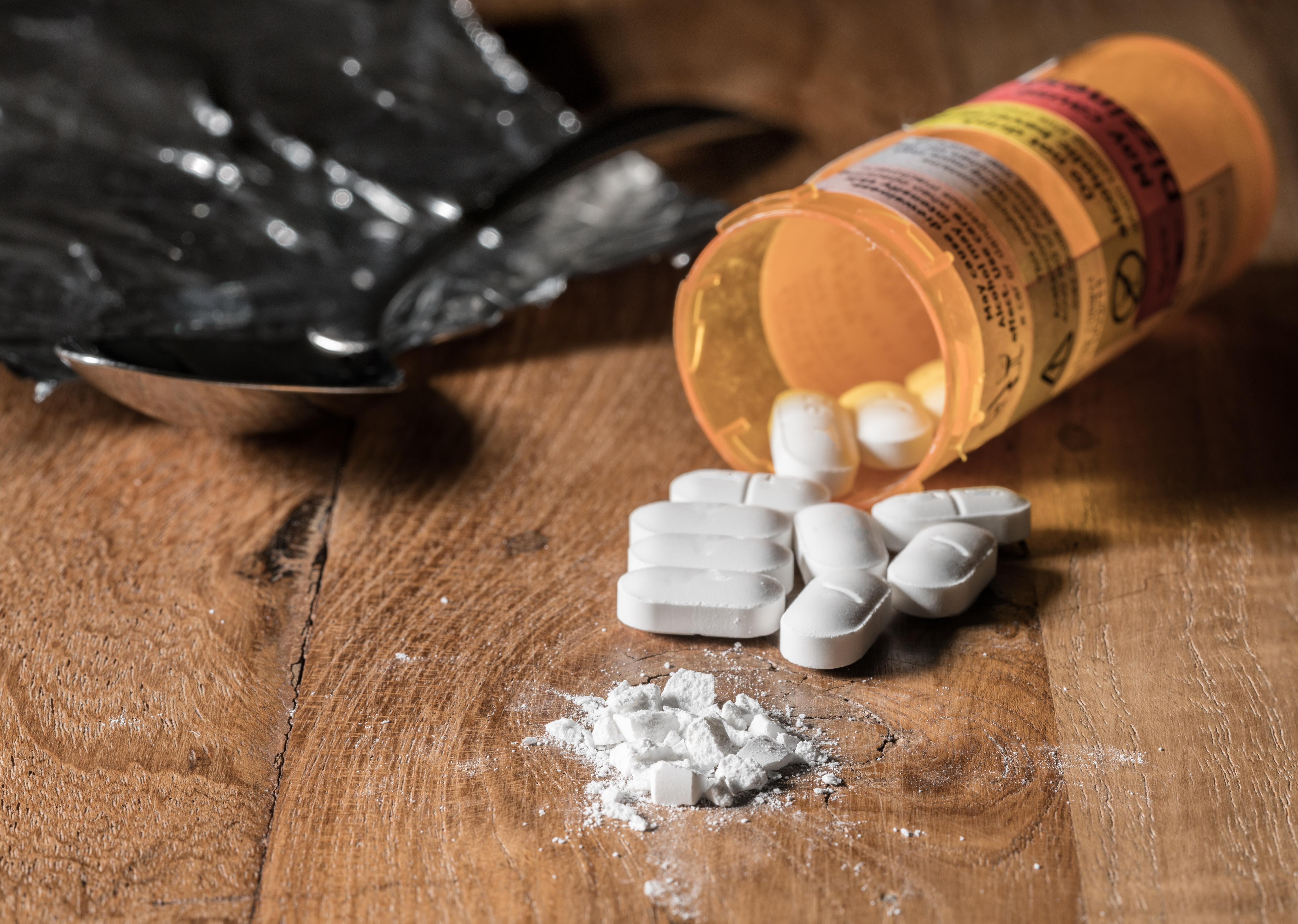 Experts at Washington University School of Medicine in St. Louis are recommending that surgeons and anesthesiologists consider cutting back on the number of take-home opioid pills prescribed to patients after surgery. The nonmedical use of opioid drugs costs the U.S. economy more than $70 billion annually. Credit: Robert J. Boston/School of Medicine