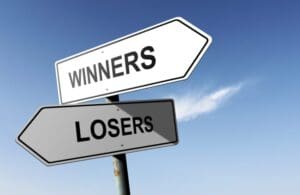 Winners and Losers directions. Opposite traffic sign.