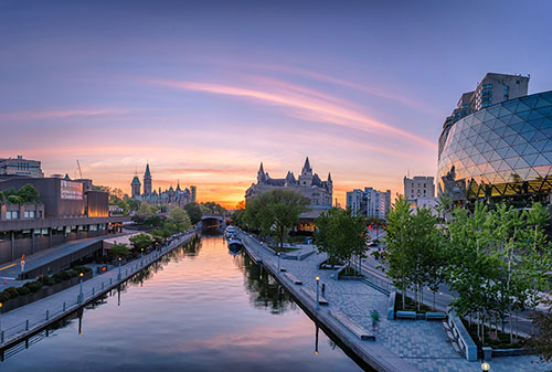 View of Parliament buildings from Plaza Bridge Ottawa during sun