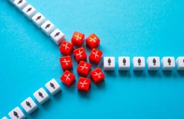 The division of the staff into two divisions of the company. Mass layoffs, work optimization and cost reduction. Crisis and downsizing of business. Reduce and save business. Keep the best employees.