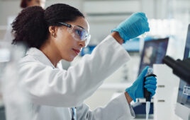 Glass vial, pipette and woman scientist in laboratory for medical study, research or experiment. Test tube, dropper and professional female person with chemical liquid for pharmaceutical innovation