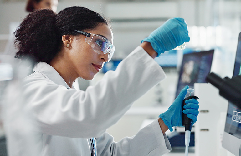 Glass vial, pipette and woman scientist in laboratory for medical study, research or experiment. Test tube, dropper and professional female person with chemical liquid for pharmaceutical innovation