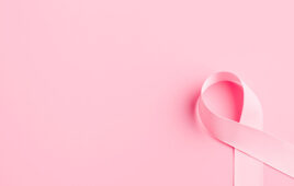 pink ribbon breast cancer on pink background